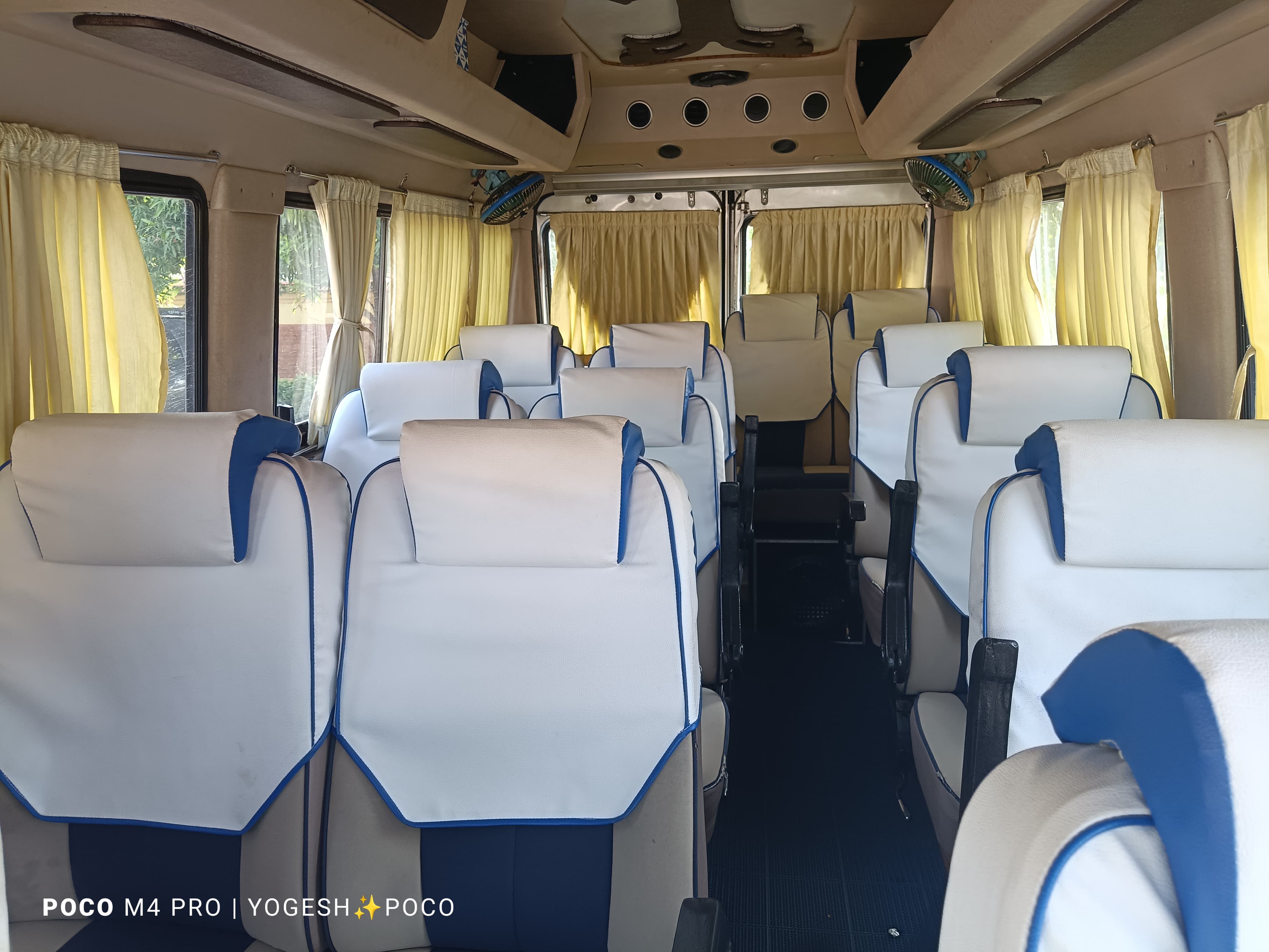 Interior view showing individual AC fans and seating